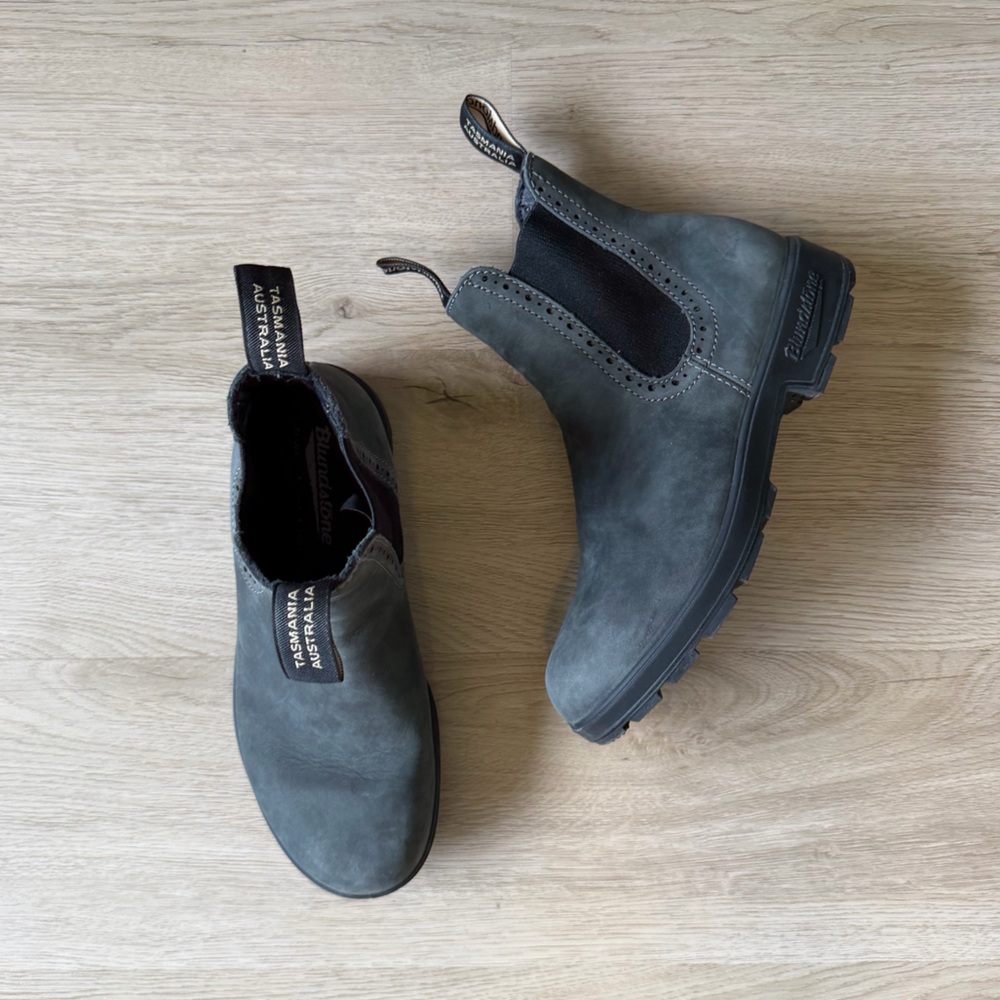 Rustic black high top blundstone boots